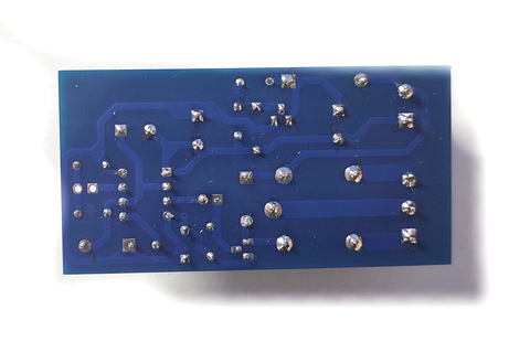 soldered pins on the back of the board for 555 timer project